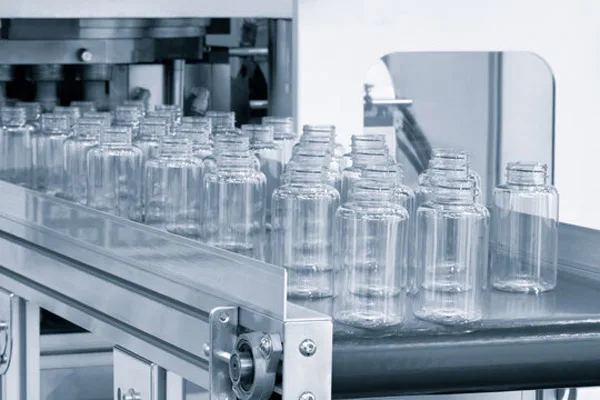 Blow molding plastic bottles